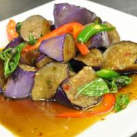 Eggplant with Black Bean Sauce *** · Eggplant stir fried with Thai spices and black bean sauce. 
*** Thai spicy
