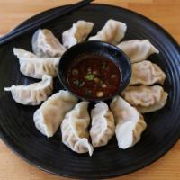 12 Homemade Dumplings (Jiao Zi) · Fresh Handmade dumplings. These dumplings are incredibly juicy, and they taste similar to so...