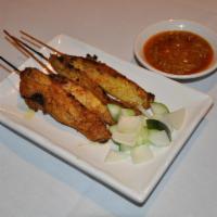Satay Chicken · Marinated chicken on skewer grilled to perfection. Served with Malaysian peanut sauce.