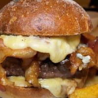 French Burger · Caramelized onions, blue cheese, crispy bacon, cheddar fondue with balthazar potato baps and...