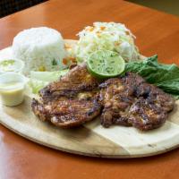 Pollo Parrillero · 8 oz. grilled chicken white or dark meat seasoned with our Peruvian spices, panca pepper, ga...