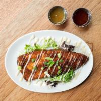 4. Crispy Trout · house lightly breaded trout fillet (6oz.) over fresh greens, side pineapple chili sauce, and...