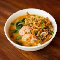23. Tom-Yum Noodle Soup · Crispy & steamed egg noodle in hot & sour soup, ground chicken, shrimp, peanut, beansprout, ...
