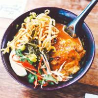25. Khao Soi · crispy and steamed egg noodle, your choice of protein cooked in northern Thai ginger & turme...