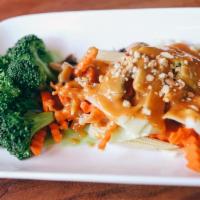 42. Pra Ram (GF, VG) · steamed broccoli, cabbage, carrot, mushroom, bamboo shoot and baby corn, topped with peanut ...