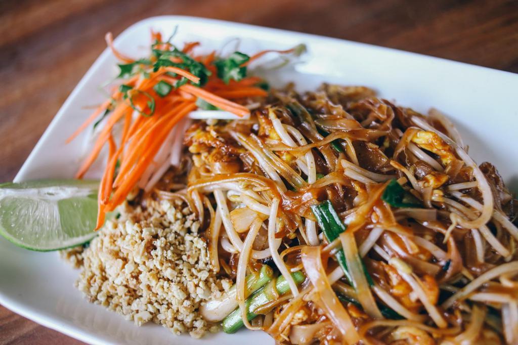 45. Pad Thai (GF) · Thin rice noodle, egg, bean sprout, red and green onion, and ground peanut in house tamarind sauce.