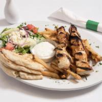 Chicken Souvlaki Platter · Skewered seasoned chicken. Served with hand cut fries, tzatziki sauce, Greek dinner salad an...