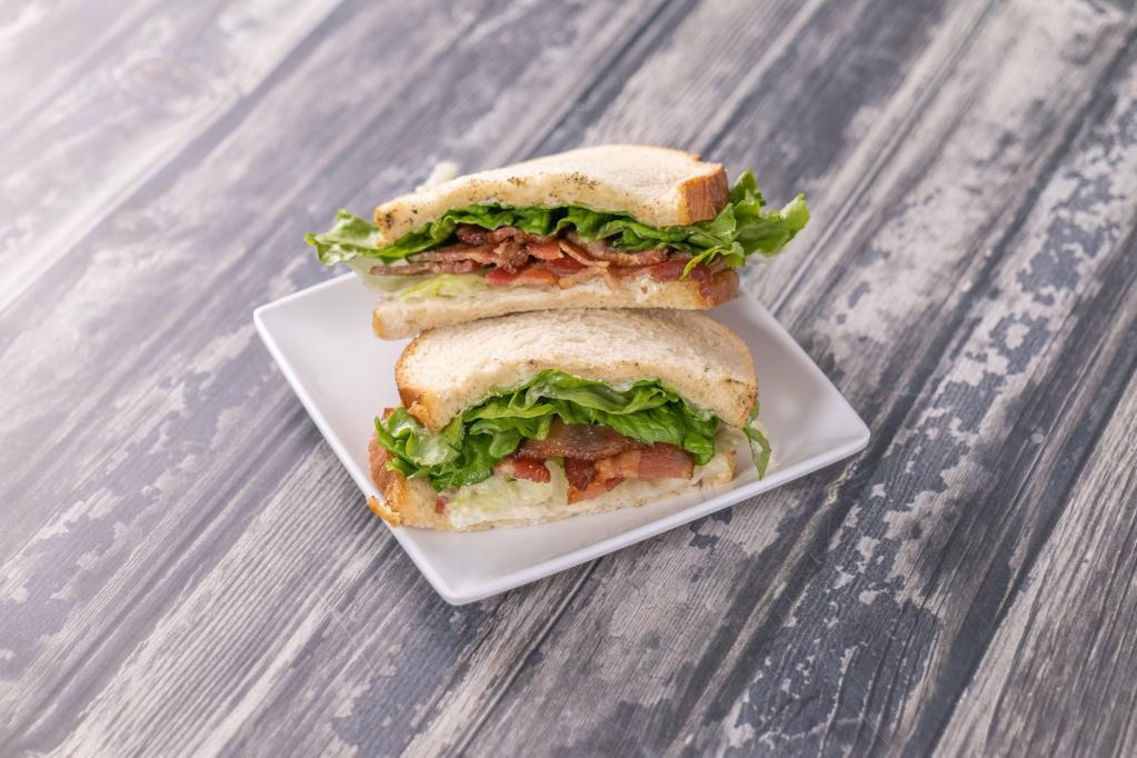 BLT Sandwich · Bacon, lettuce, tomato, mayo or 1000 Island and bread.