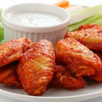 Hot Wing Special · X-large 1-topping pizza with your choice of side, 1 lb. chicken wings and 4 fountain drinks.