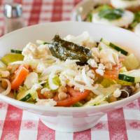Mediterranean Salad · Lettuce, tomatoes, cucumber, onions, kalamata olives, chickpeas, feta and stuffed grape leav...