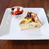 Breakfast Daily Quiche Selection · Served with choice of bread and side.