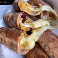 Tequeyoyo · Cheese, sweet plantain and ham wrapped in flour dough.