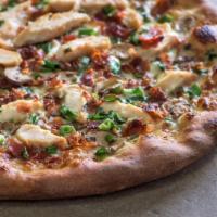 D'Lex Chicken and Bacon Pizza · Chicken, bacon, mushrooms, garlic and green onions in a white sauce.