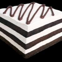Brownie Layer Cake · Rich and chewy chocolate brownie layered with vanilla ice cream. Very elegant and very good!...