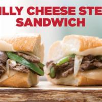 Philli Cheese Steak · Thinly sliced sirloin steak, grilled to perfection, mixed with caramelized onions and green ...
