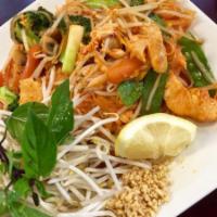 40) Pad Thai · Pan-fried rice noodles sauteed with vegetables in a sweet and spicy sauce.