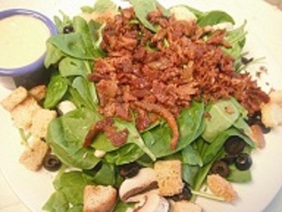 Spinach Salad · Fresh spinach, mushrooms, croutons, bacon, olives and honey mustard dressing.