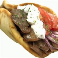 Gyros Sandwich · Chicken or beef and lamb in a pita with onions, tomatoes and a generous amount of tzatziki s...