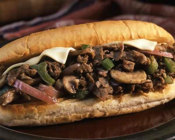 Philly Cheesesteak · Lean steak with cheese, bell peppers, mushrooms, and onions.