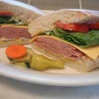 Ham Sandwich · Served on a fresh baked Zorbas bread with mayo, mustard, lettuce, tomatoes, and onions.