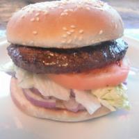Hamburger Deluxe · Lean beef on a sesame seed bun with mayo, mustard, lettuce, tomatoes and red onions.
comes w...
