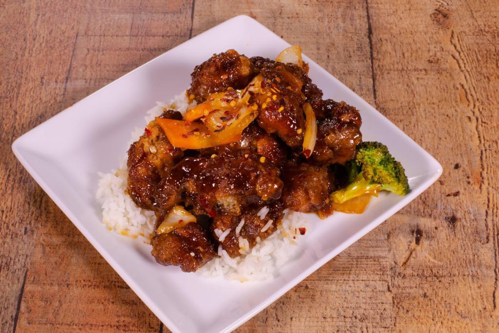 13. General Tso's Chicken Plate Dinner · Served with a mild chili sauce and fresh bell peppers and onions. Hot and spicy.