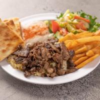 Shawarma Beef or Chicken Plate · Served with rice, fries, hummus and salad. 