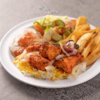 Boneless Chicken Plate · Served with rice, fries, hummus and salad. 