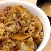D4. Gyudon · Beef and onion, simmered in soy sauce-based broth on rice. Served with miso soup and house s...