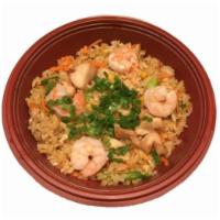 70. Special Fried Rice · Served with shrimp, chicken, vegetables and egg.