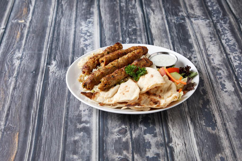 Shish Kabab Wrap · With salad, rice and naan bread.