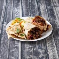Beef Wrap · Served with salad rice and naan bread.
