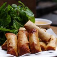 13. Mini Summer Roll - Chả Giò · 10 pieces. Ground chicken, mushroom, carrot and taro. Deep fried. Served with lettuce, mint ...