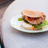 L.P. Fried Chicken Sandwich · Crisp fried chicken breast, romaine and spicy mayo.