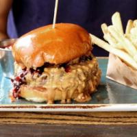Our Famous PB & J Burger · A PS original with crunchy peanut butter,
blackberry habanero jam, certified angus beef and ...