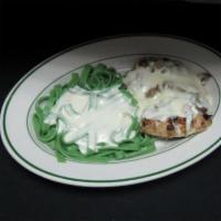Classic Grilled Chicken Alfredo · Grilled chicken breast topped with mozzarella and mushrooms served with spinach fettuccine A...