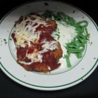 Veal or Chicken Parmigiana · Served with linguini tossed in olive oil and garlic.