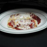 Manicotti with Italian Sausage Pasta · Pasta filled with ricotta cheese topped with marinara and mozzarella cheese.