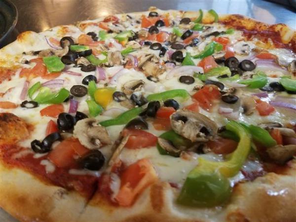 Vegetarian Pizza · Fresh mushroom, red onion, green pepper, black olive and fresh tomato.