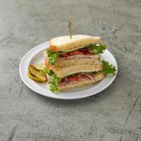 Killer Club Specialty Sandwich · Turkey, ham, bacon, lettuce, tomatoes, onions, mayo, mustard and cheese.