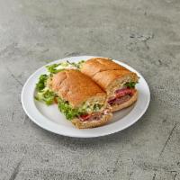 London Broil Specialty Sandwich · Roast beef, blue cheese dressing, lettuce, tomatoes, onions and avocado.