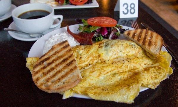 Greek Omelette · Spinach, tomato, black olives and feta cheese.