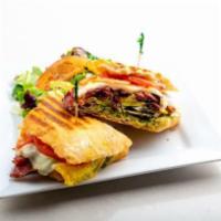 Heart Stopper Panini · Pastrami, egg, avocado, onion, tomato, olives, pesto and your choice of cheese. Includes our...
