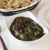 M9. Palak Paneer · Paneer Cubes in creamed spinach and fresh spices. Vegetarian. Served with 8 Oz Rice.