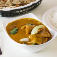 M18. Chicken Tikka Masala · Boneless chicken cooked in thick creamy sauce. Served with 8 Oz Rice.