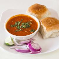 B13. Pav Bhaji · 2 pieces. Special mixed veggies mixed with homemade spices. Served with pav, a special kind ...