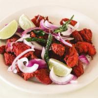 B14. Chicken 65 · Fried chicken dish popular in South India as a bar snack. Marinated with 65 spices.