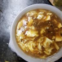 Hot and Sour Soup · A traditional Chinese soup with broth, eggs, tofu and vegetables. Spicy.