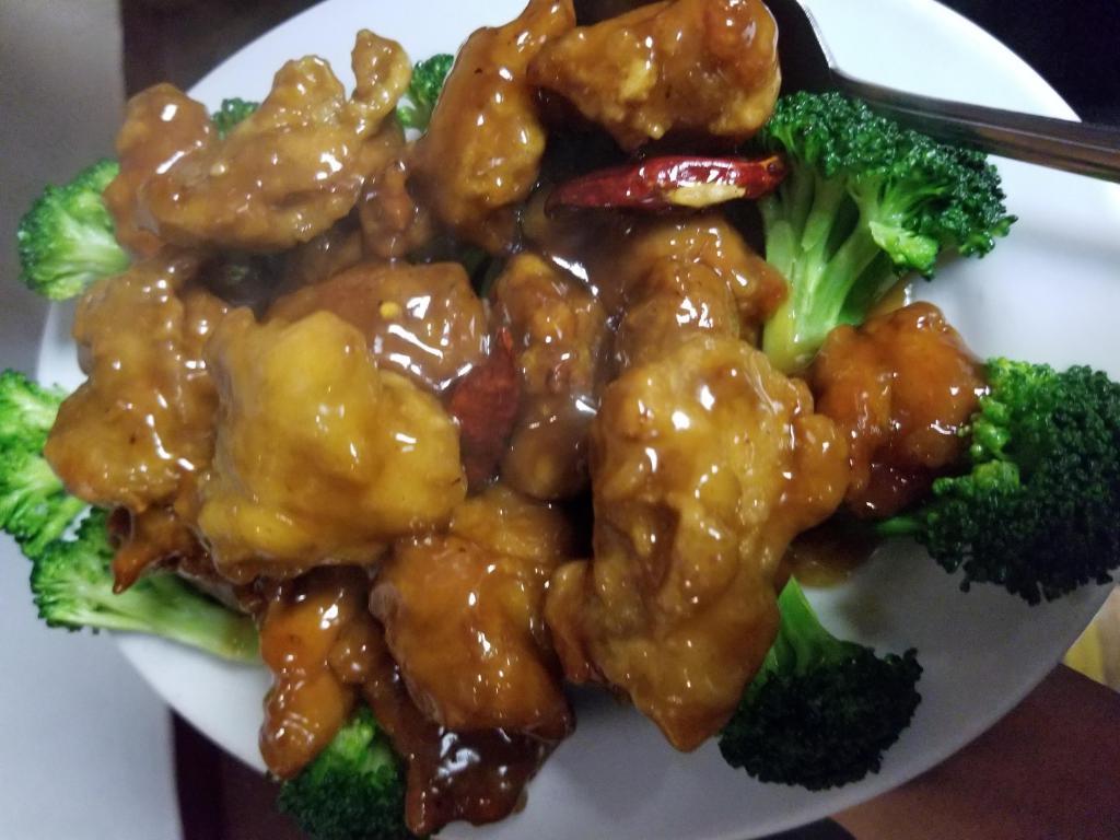 General Tso's Chicken · Deep fried chicken chunks prepared with hot pepper sauce. Spicy.