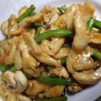 30. Moo Goo Gai Pan · Stir fried chicken and vegetable dish.